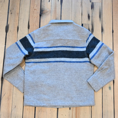 Filson Ladies Wool Overshirt in gray with black blanket stripes, chest pockets, and button front