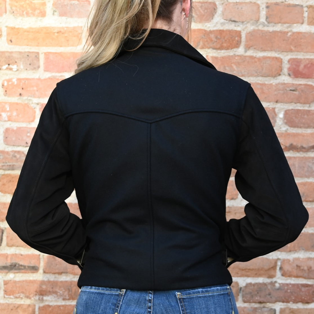 View of Black wool and suede Chimayo-style jacket by Schaefer with Western yoke and adjustable waist tabs