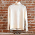 View of Pendleton ladies ivory merino turtleneck sweater with raglan sleeves and ribbed edges