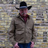 View of Schaefer ranch-style waxed cotton Mesquite Brush Jacket in oak or saddle with brass snap buttons