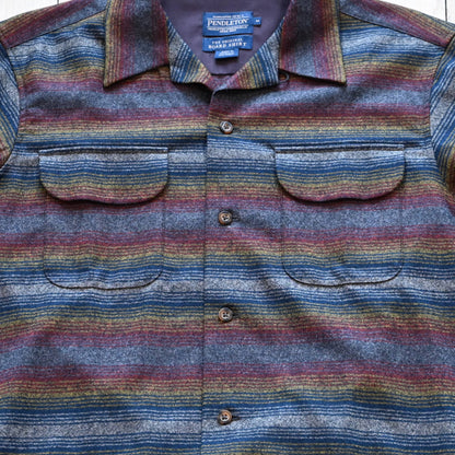 View of Pendleton men’s wool board shirt in brown multi ombré stripe with bias pockets and square hem