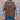 View of Schaefer whiskey-colored leather vest with Western yoke design, lapel front, and dual pockets
