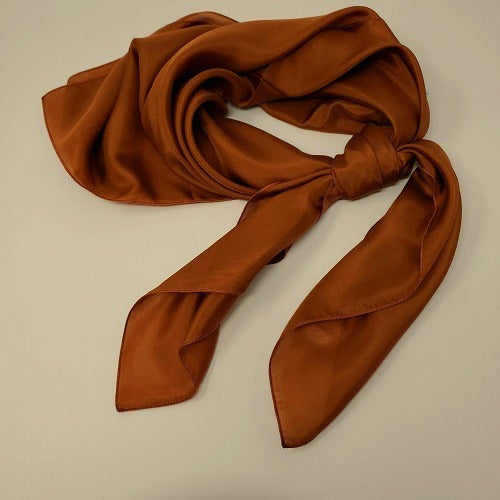 Cowboy Images 36x36 silk wild rag in adobe-inspired earth tones