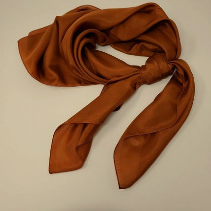 Cowboy Images 36x36 silk wild rag in adobe-inspired earth tones