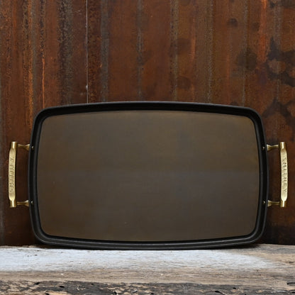 View of Smithey Ironware Double Burner Griddle with polished surface and dual riveted handles