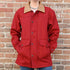 View of Schaefer ladies red wool rancher coat with leather collar, snap vents, and drawcord waist