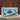 Myra Alpine blue leather wallet with textured Azure Mesa design and organized interior