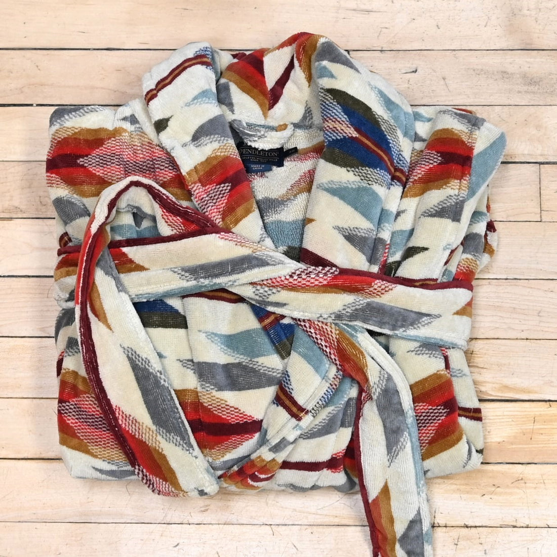 View of Pendleton robe in Wyeth Trail Oatmeal with shawl collar, tie waist, and patch pockets