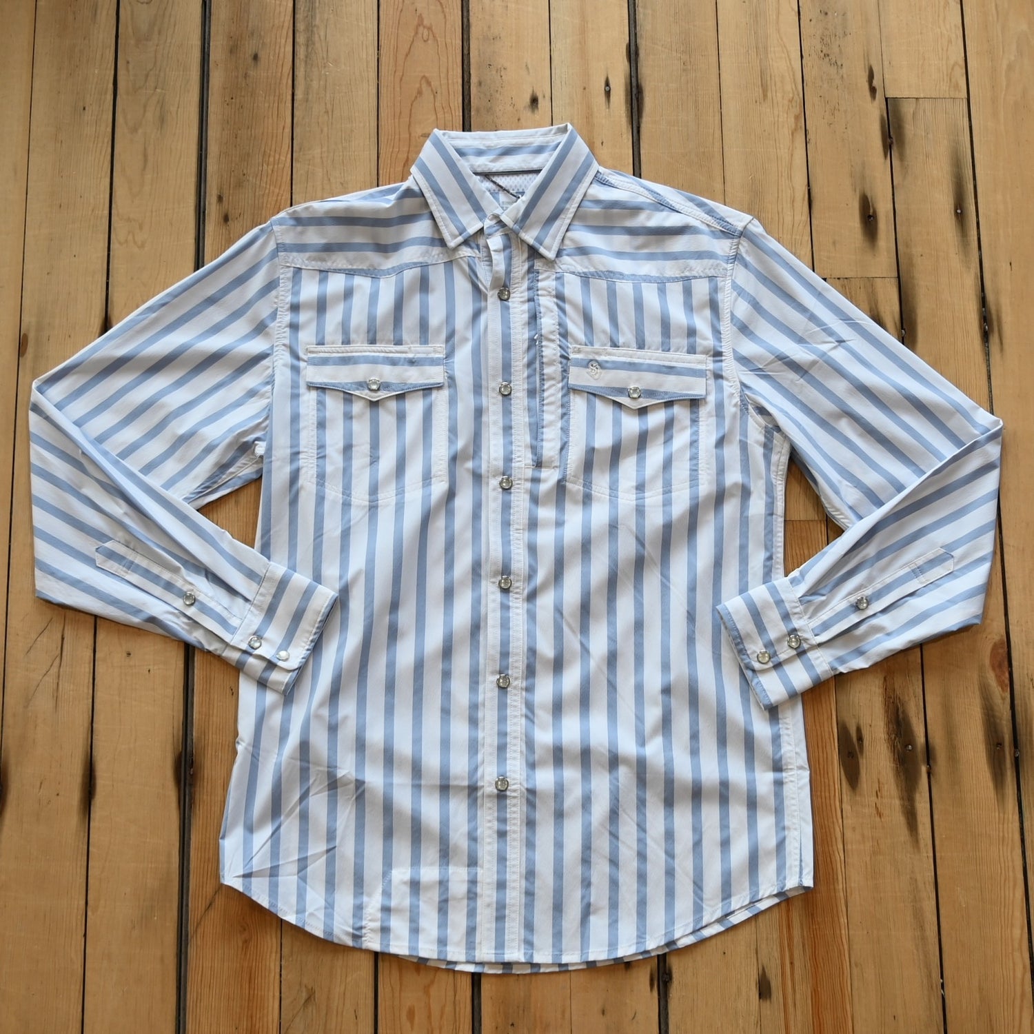 View of Schaefer blue stripe Western snap shirt with mesh-back vent and chest pockets