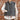 View of Schaefer grey wool vest with zip front, pockets, and adjustable back belt