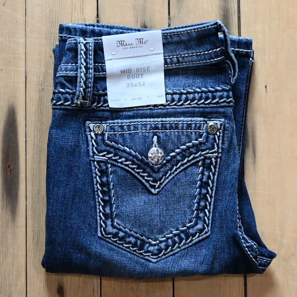 Miss Me Mid Rise Boot Cut Ladies Jean with boot cut leg and embroidered back pockets