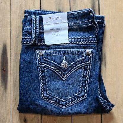 Miss Me Mid Rise Boot Cut Ladies Jean with boot cut leg and embroidered back pockets