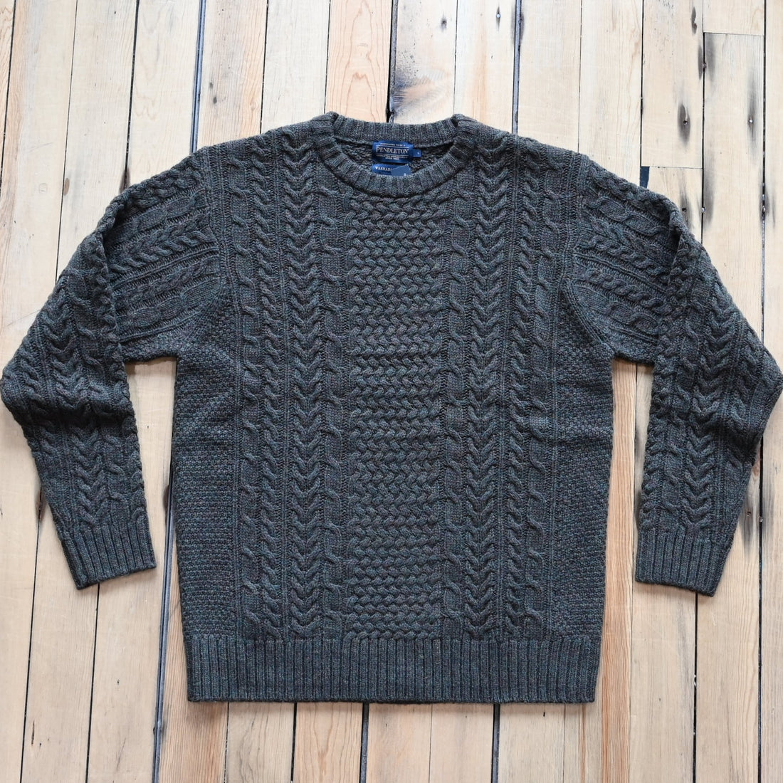 View of Pendleton men’s wool fisherman sweater in Camo Heather with cable knit