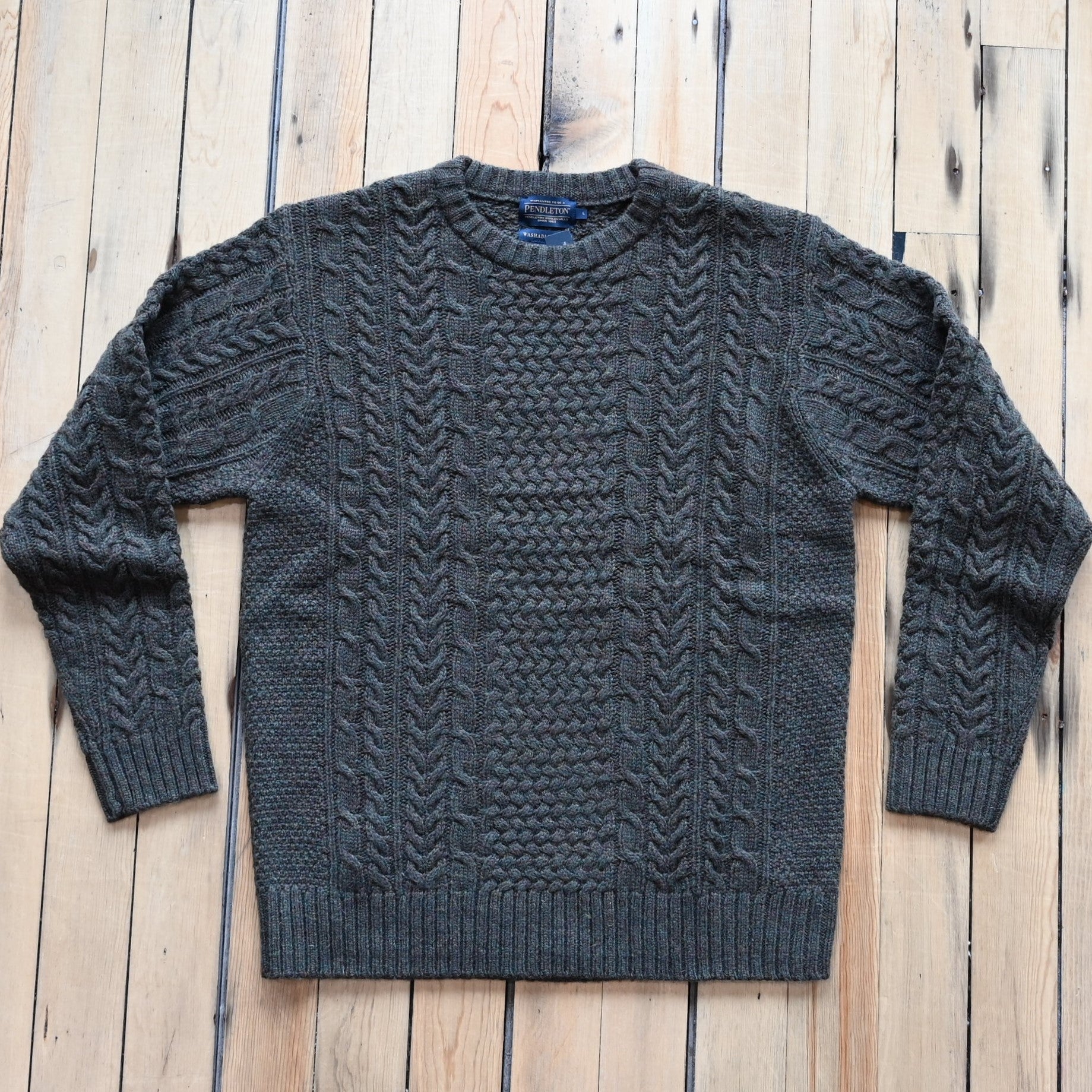 View of Pendleton men’s wool fisherman sweater in Camo Heather with cable knit
