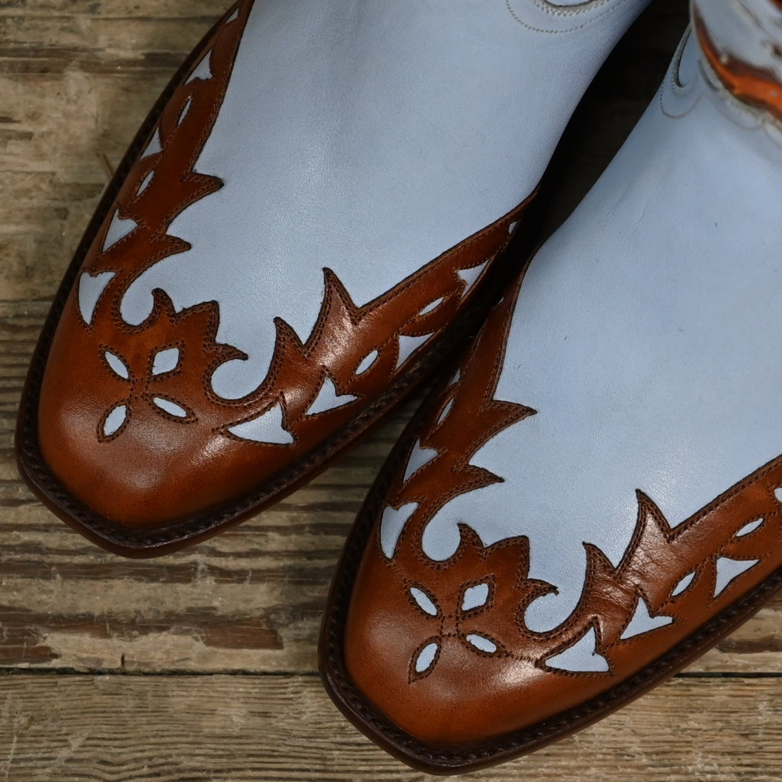 View of Stallion Ladies 9&quot; Peewee boot in powder blue calf with vintage wingtip and combo heel