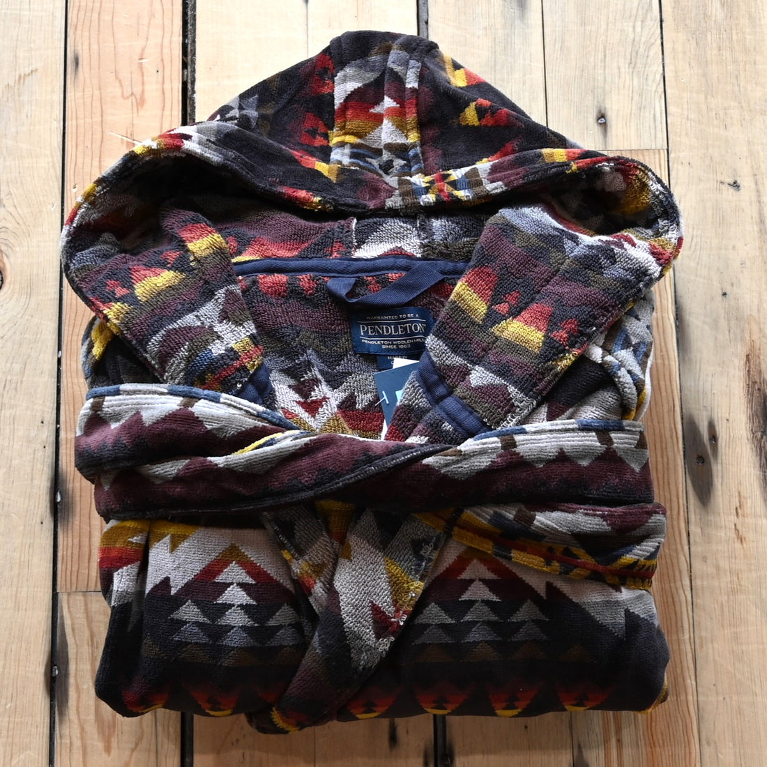 View of Pendleton unisex cotton terry velour robe in assorted patterns with hood and pockets