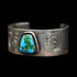 View of Sunwest Silver Leonard Nez Navajo Sonoran Gold Turquoise Cuff featuring Sonoran Gold turquoise with etched patterns in sterling silver