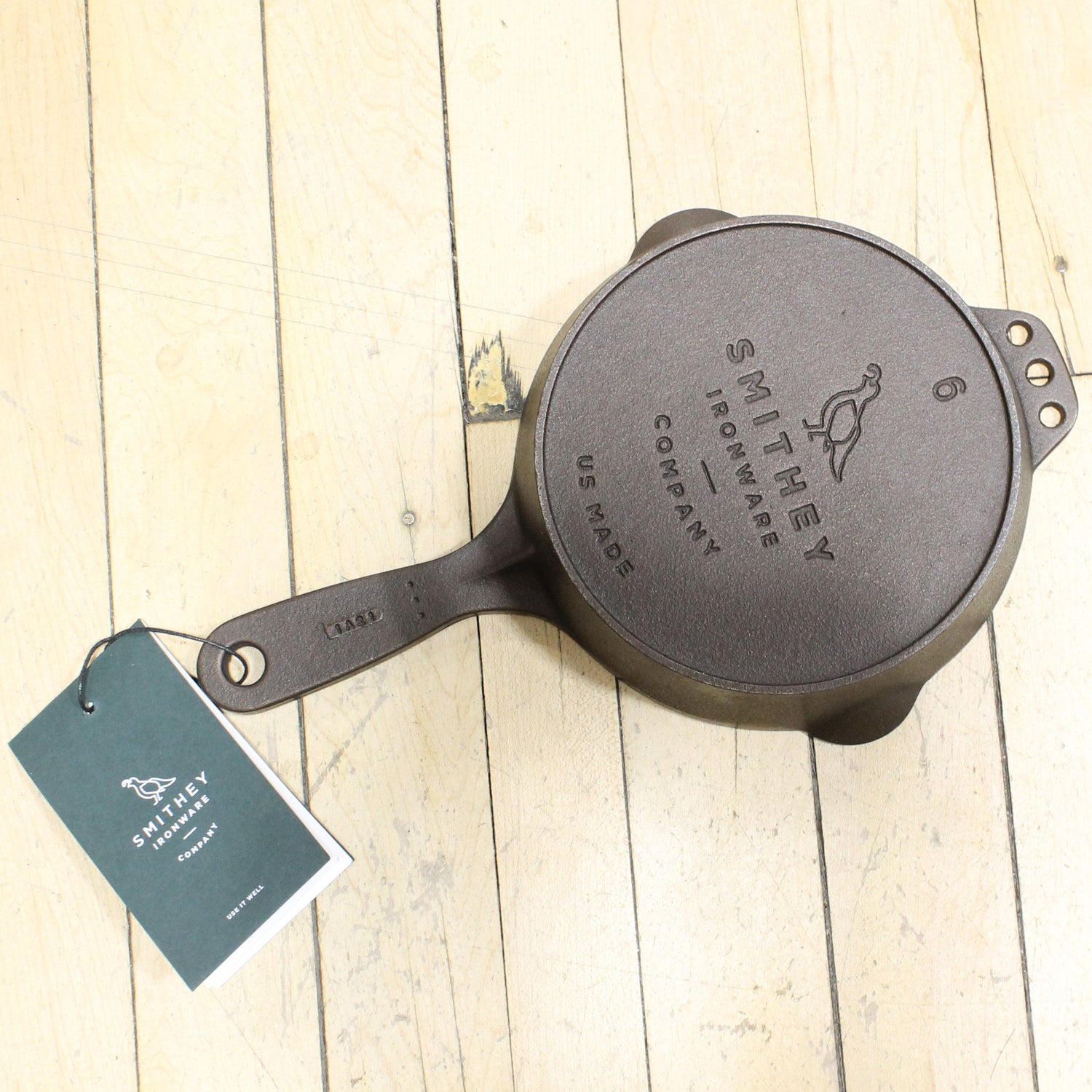 View of Smithey Ironware No. 6 Cast Iron Skillet with polished interior and ergonomic handle