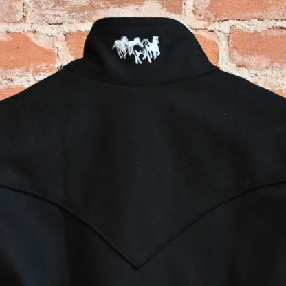 View of Schaefer ladies wool Arena vest in black or red with Western yokes and storm-flap zip front