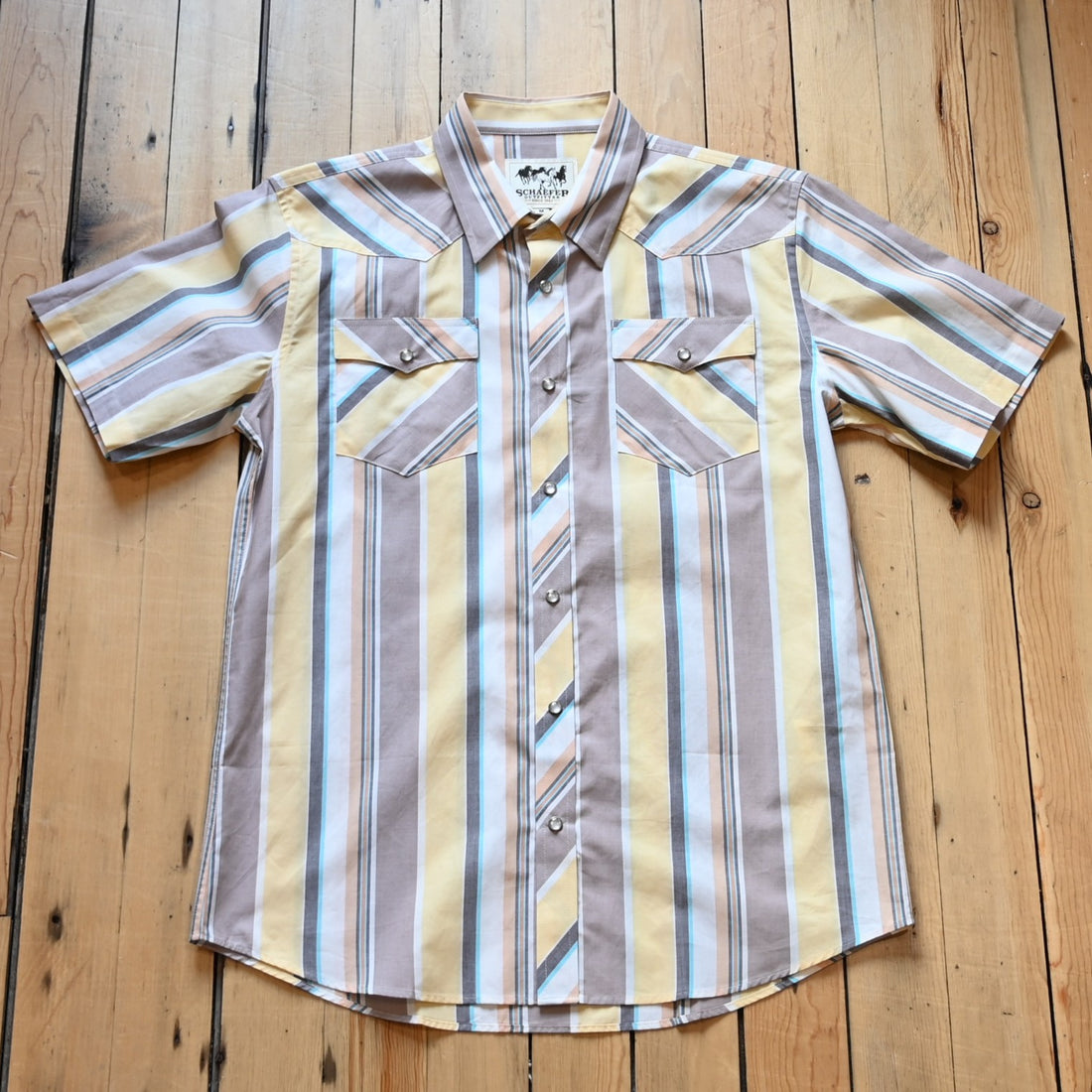 View of Short sleeve vintage cotton pearl snap shirt in Alamo with Western yoke and chest pockets