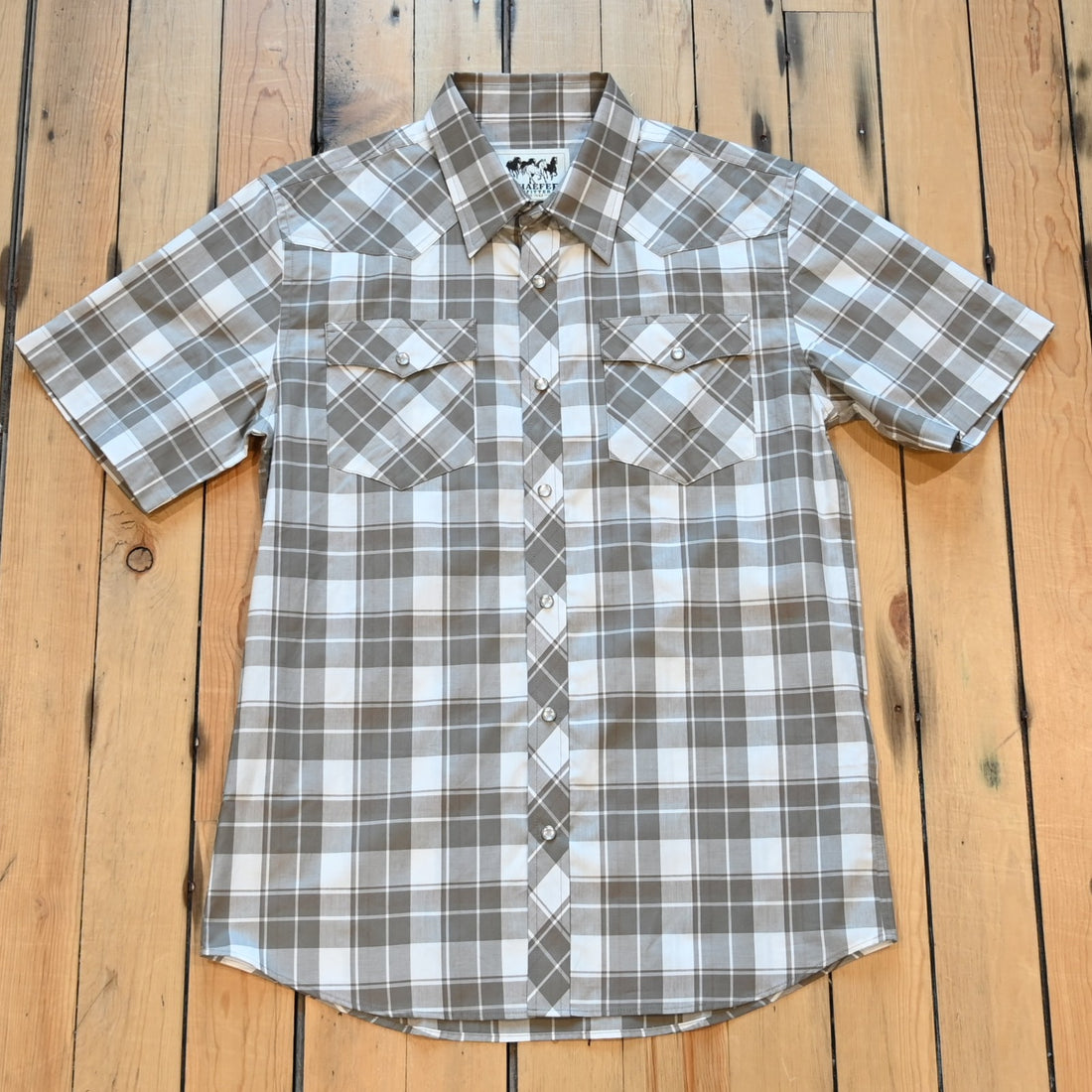 View of Highlands short sleeve vintage cotton pearl snap shirt with Western yoke and chest pockets