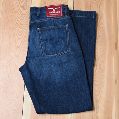 View of Kimes Ranch Dillon Jeans in Blue, featuring a mid-low rise, relaxed upper thigh, and wide bootcut leg with hand-sanded details