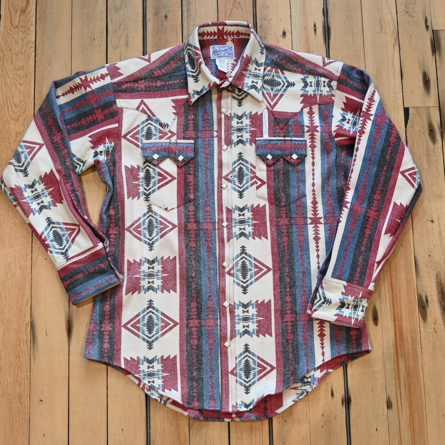 View of Rockmount men’s red and white premium flannel shirt with jacquard pattern and western snaps