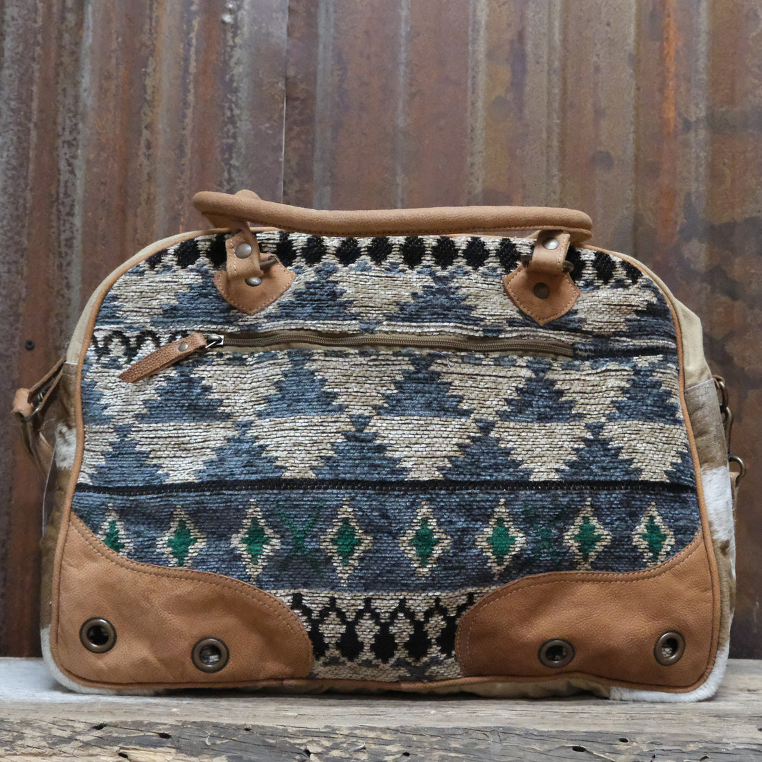 American Darling neutral geo canvas duffel bag with leather trim and geometric pattern