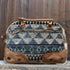 American Darling neutral geo canvas duffel bag with leather trim and geometric pattern