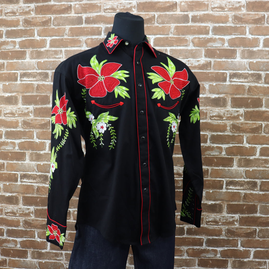 View of Black Western shirt with red hibiscus embroidery and shotgun cuffs