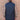 View of Filson Denim Insulated Work Vest in Raw Indigo featuring wool-blend rib-knit collar and four-pocket design