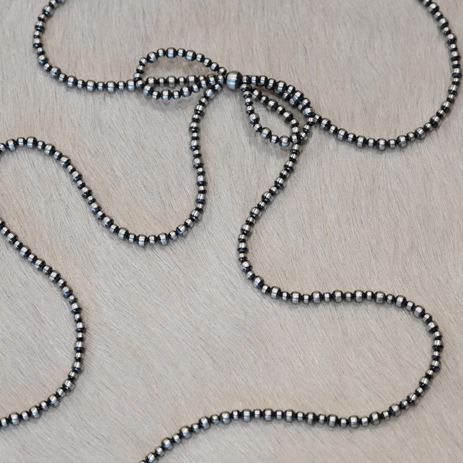 Sunwest Silver Long-Bow Oxybead Necklace with oxidized beads and cascading extra-long strands