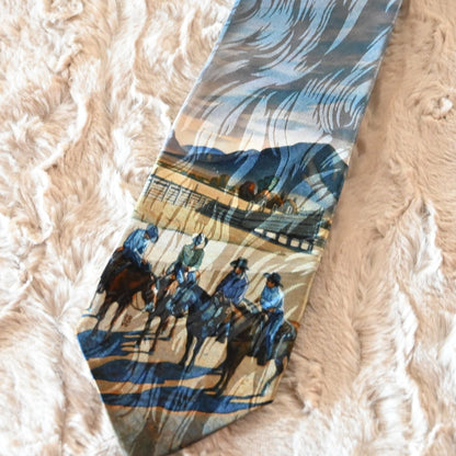 View of Rockmount “Cattleman Conference” silk tie featuring cowboy scene by Howard Post