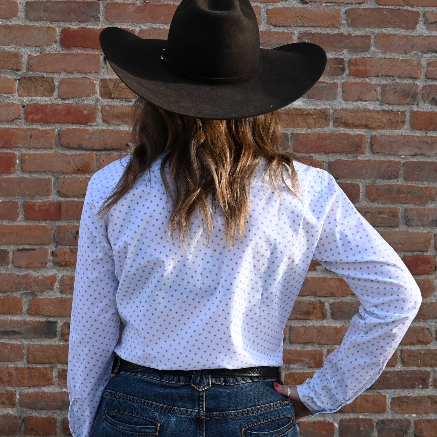 View of Blue Blanket ladies blue star western shirt with pearl snaps and bold motif