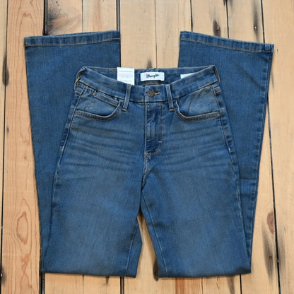 View of Wrangler Ladies boot cut jeans in Ada wash with high-rise fit from the Bespoke Collection