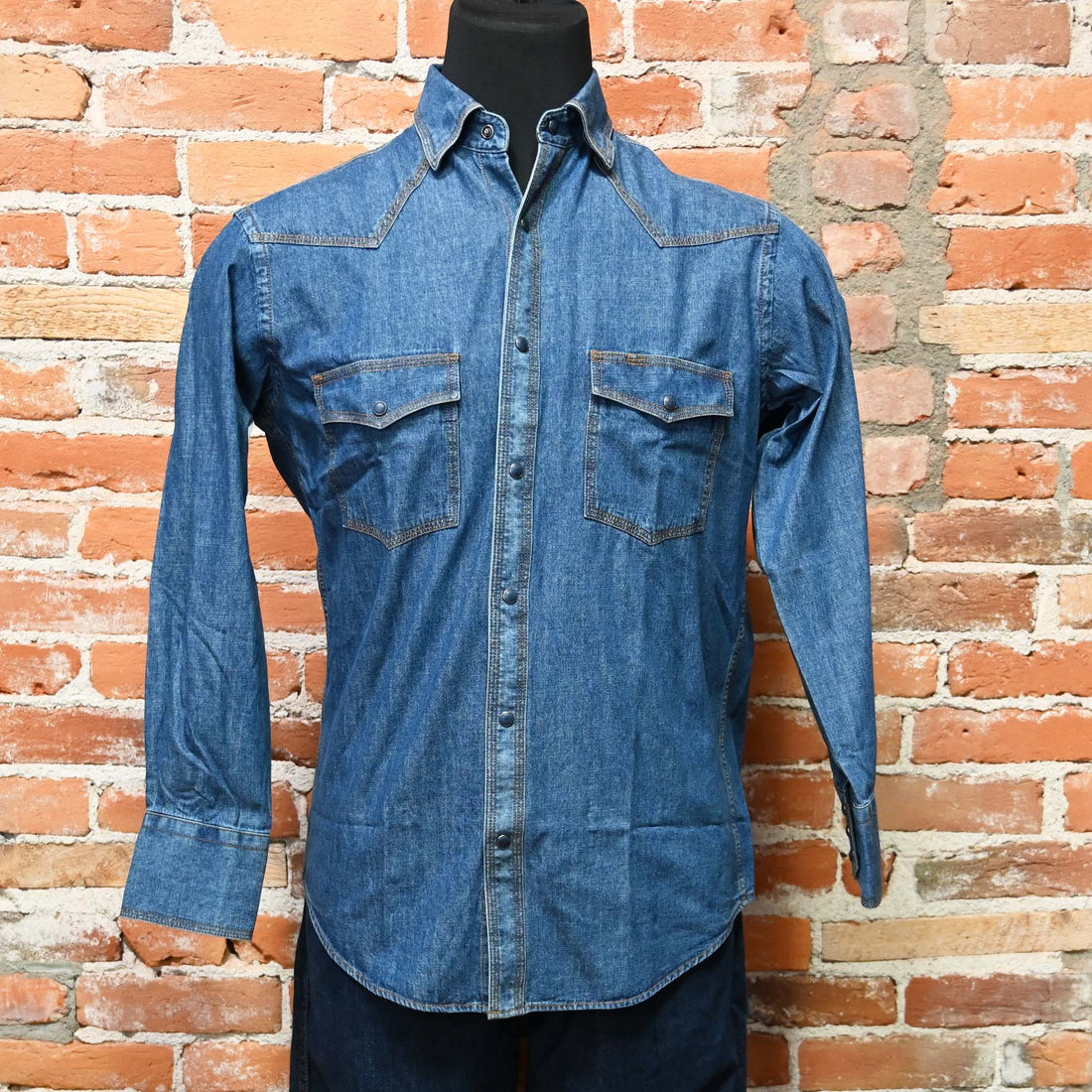 View of Indigo or blue Schaefer Classic Abilene western snap shirt with pumpkin stitching and pearl snaps