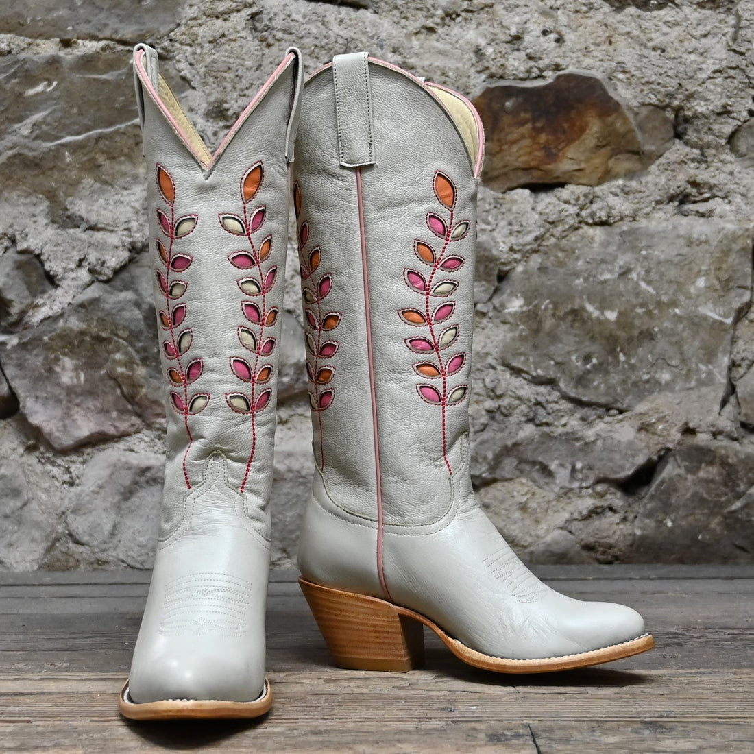 View of Macie Bean 15″ Cream Hotshot boot with almond vamp and citrus inlay shaft