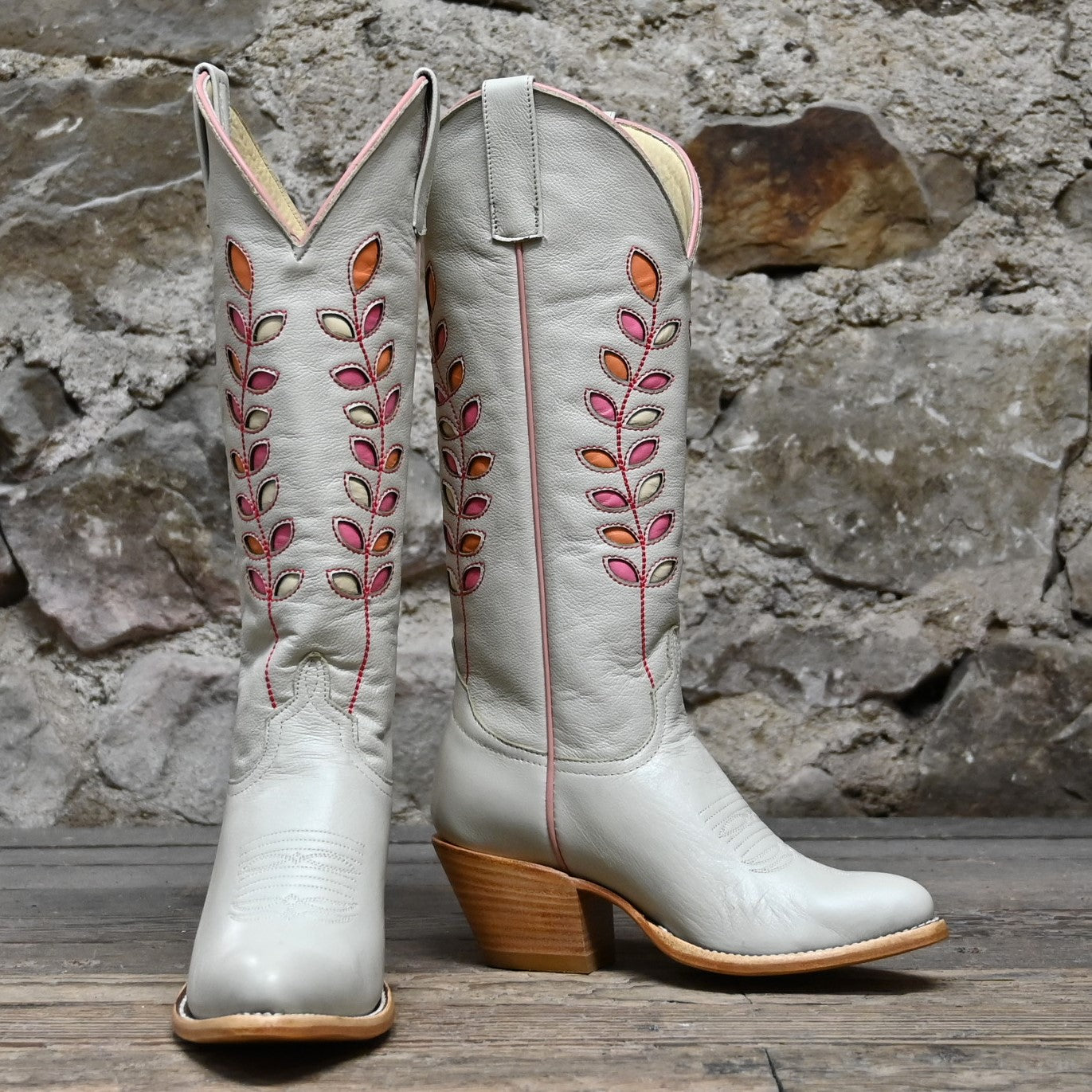 View of Macie Bean 15″ Cream Hotshot boot with almond vamp and citrus inlay shaft