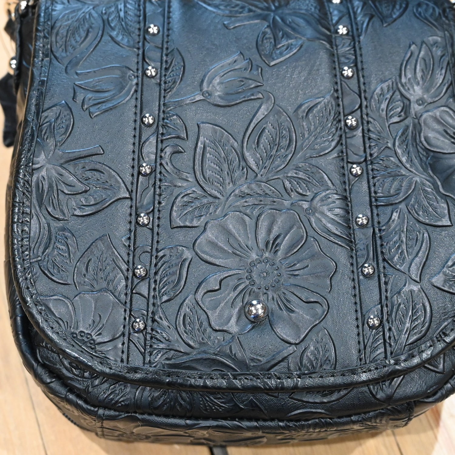 Gun Toten Mamas black studded flap conceal carry bag with embossed rose-leaf tooling