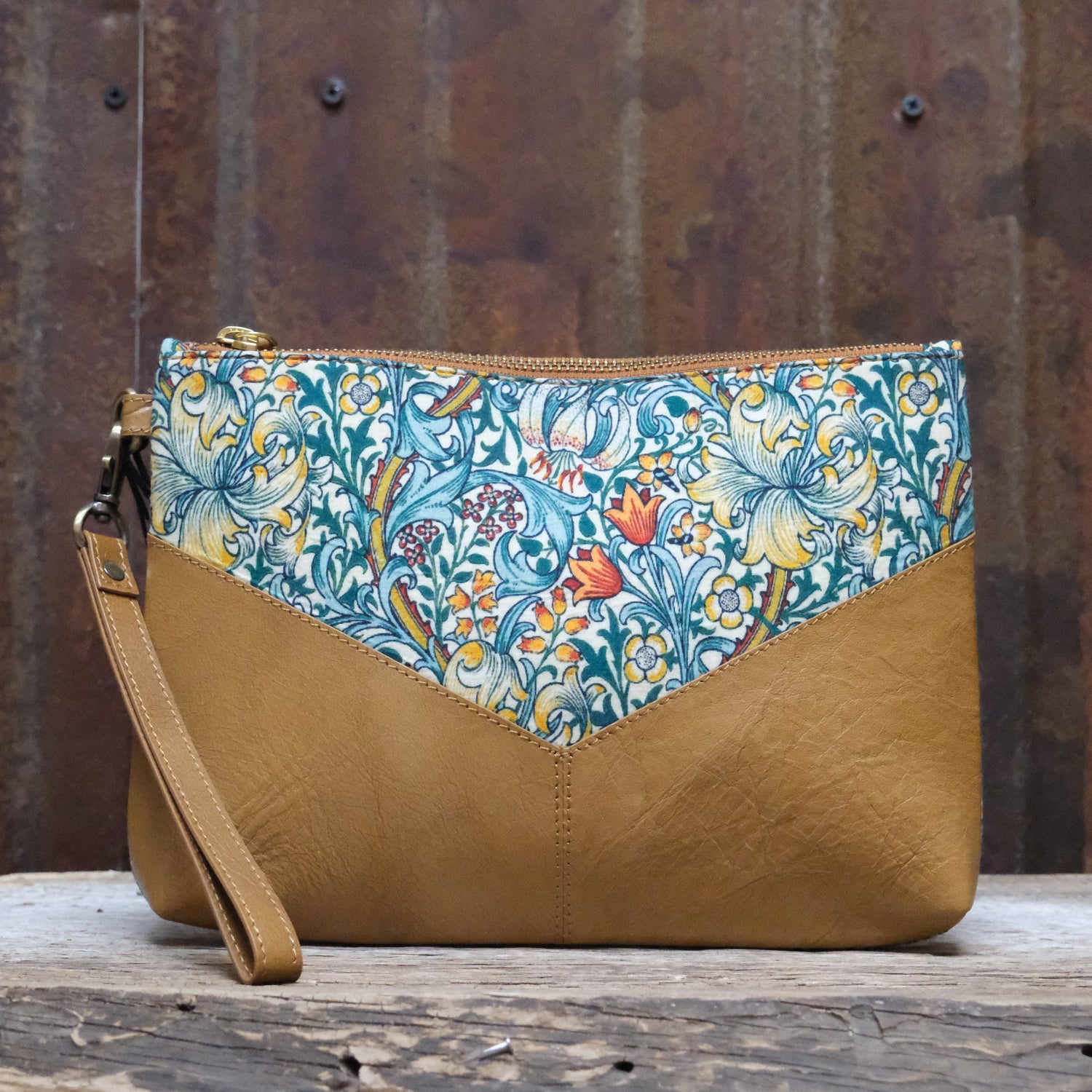 Myra My Own Garden printed canvas clutch bag with leather trim and zipper closure