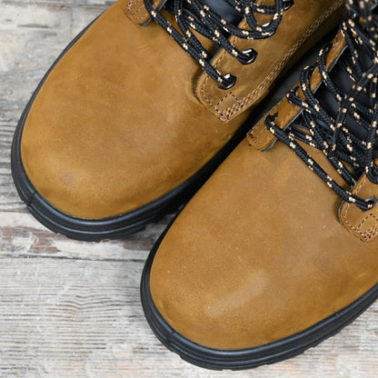 Blundstone 6-inch lace-up work boot in black leather with steel toe and safety outsole