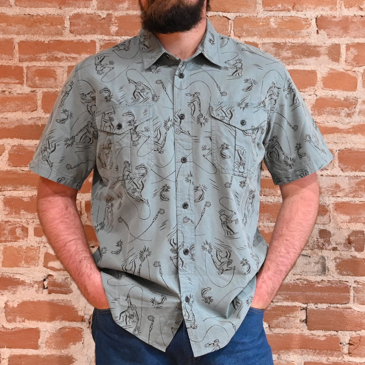 View of Filson Alaskan Guide Shirt featuring lightweight cotton twill fabric, short sleeves, and gusseted chest pockets