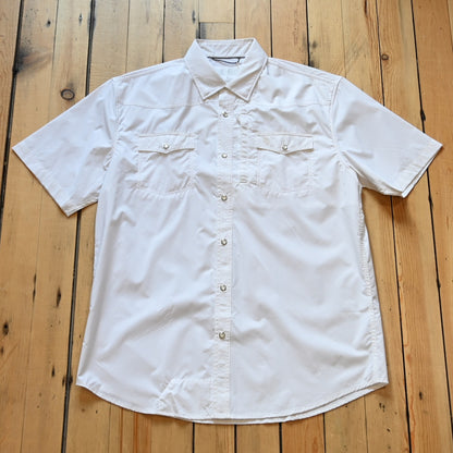 View of White short sleeve RangeTek Western snap shirt with mesh ventilation and security pocket