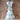 Sendero Provisions Co. The Emilia Dress in Ivory-Teal with floral embroidery.