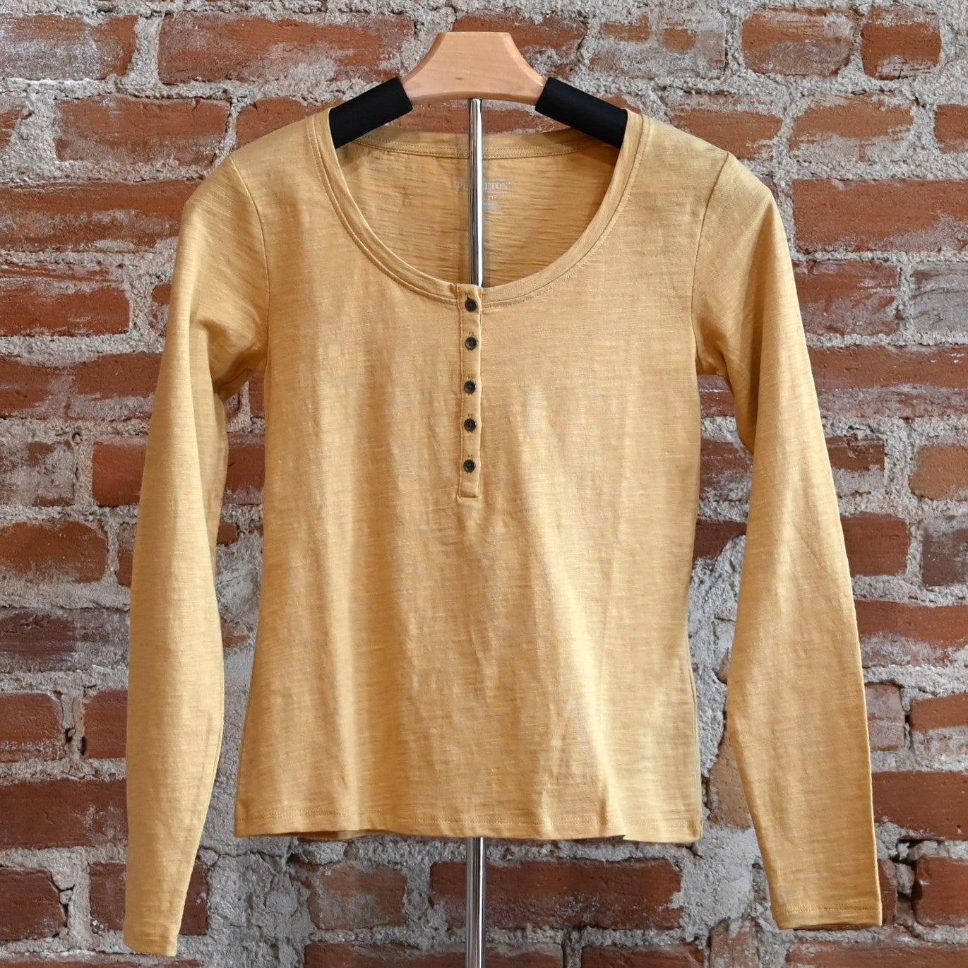 View of Pale gold Pendleton Henley tee with long sleeves and button placket