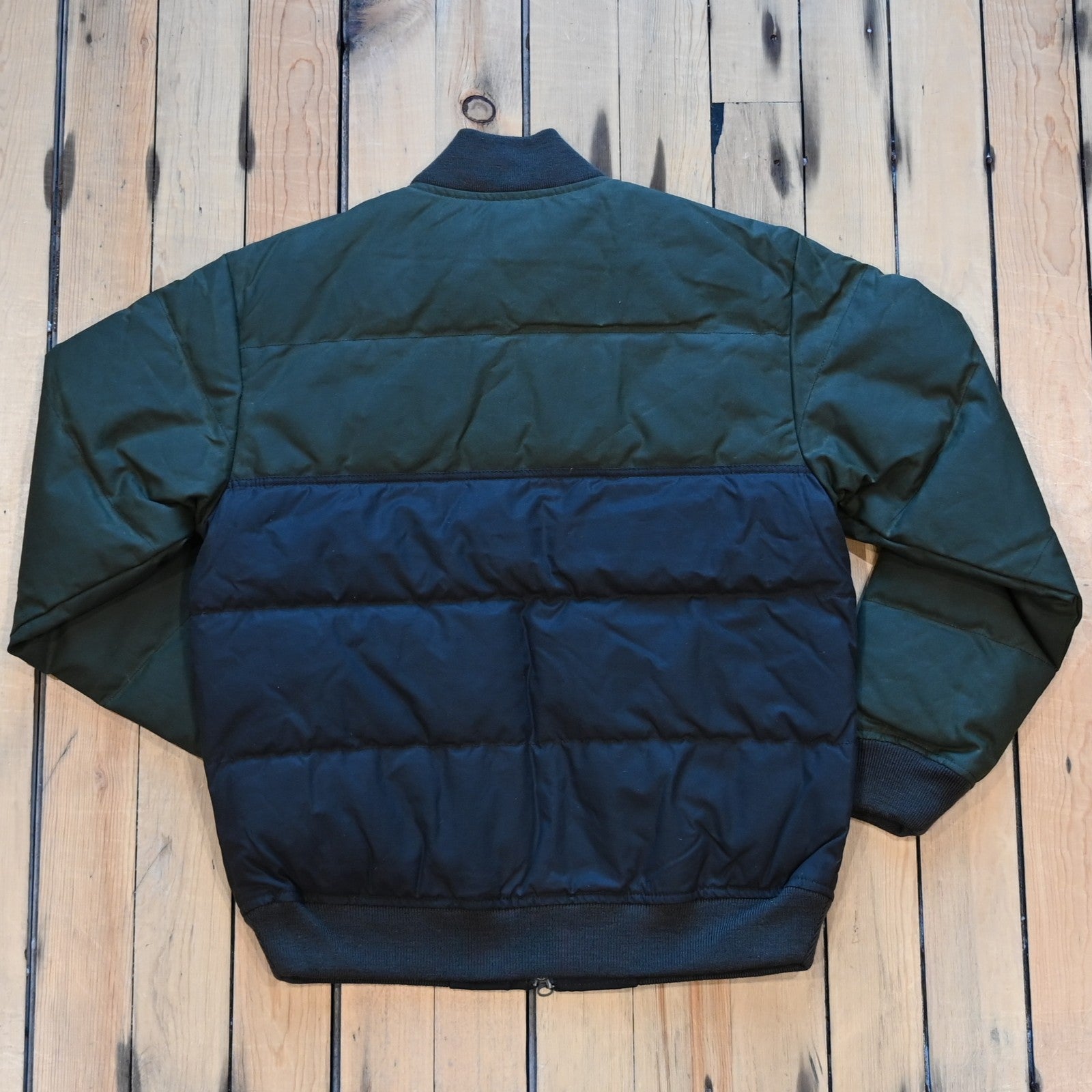 Filson down bomber jacket in otter green, waxed cotton shell with insulated down core