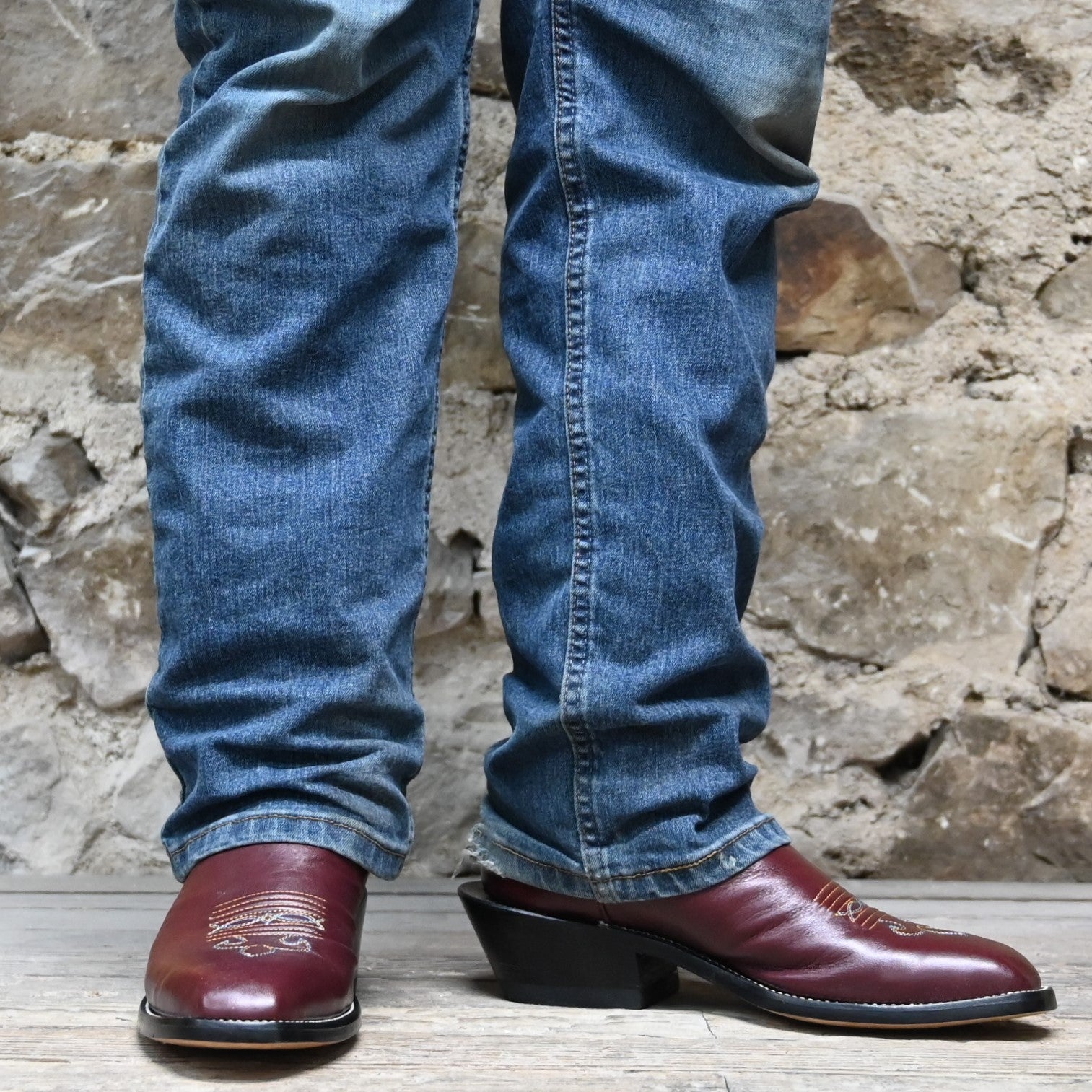View of Atomic 79 exclusive Hondo Bronc Boot with bone top, burgundy vamp, French square toe, and spur lip