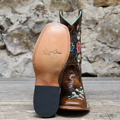 View of Macie Bean Kids Honey Bunch boot in honey leather with floral embroidery and square toe