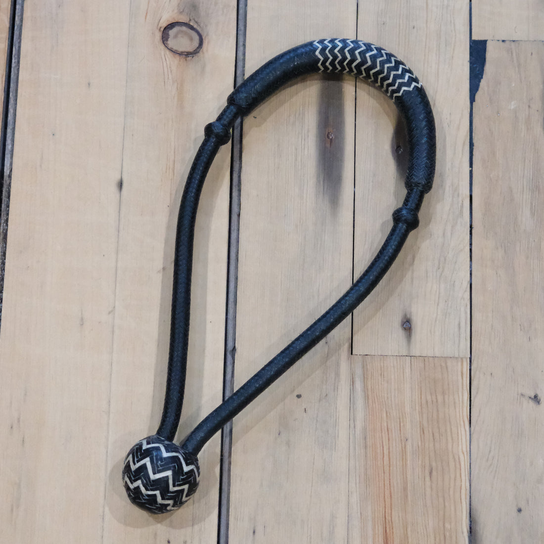Traditional Rawhide 1/2" black bosal with natural accents 20 plait