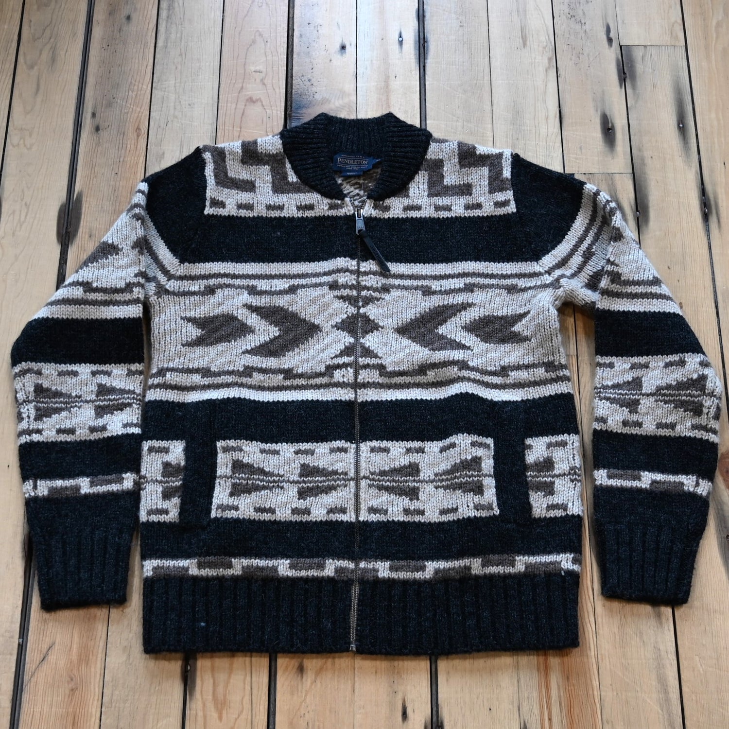 View of Pendleton Shetland zip sweater in Oxford Grey Multi with jacquard pattern and side pockets